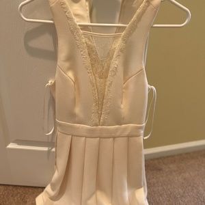 Cute BCBG cream dress